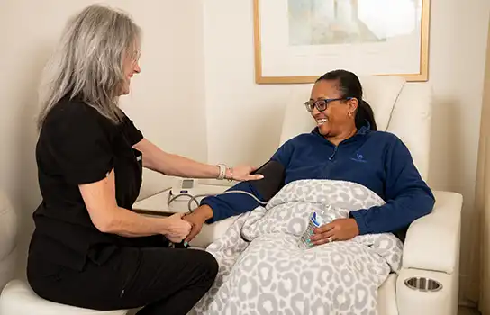Nurse Giving Patient Infusion Therapy