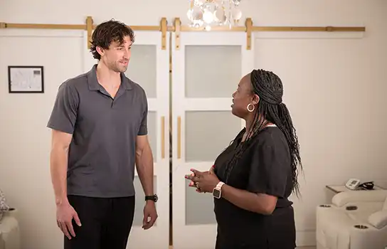 Nurse Helping Patient